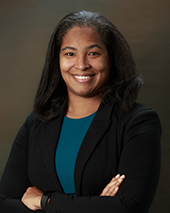 Mykoll A. Finikin-Roumain, Associate